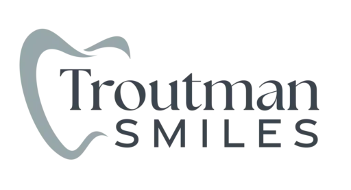 Troutman Smiles logo